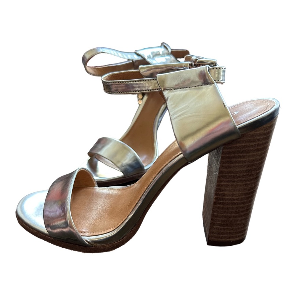 Silver heeled sandal from Coach . Used in great condition.